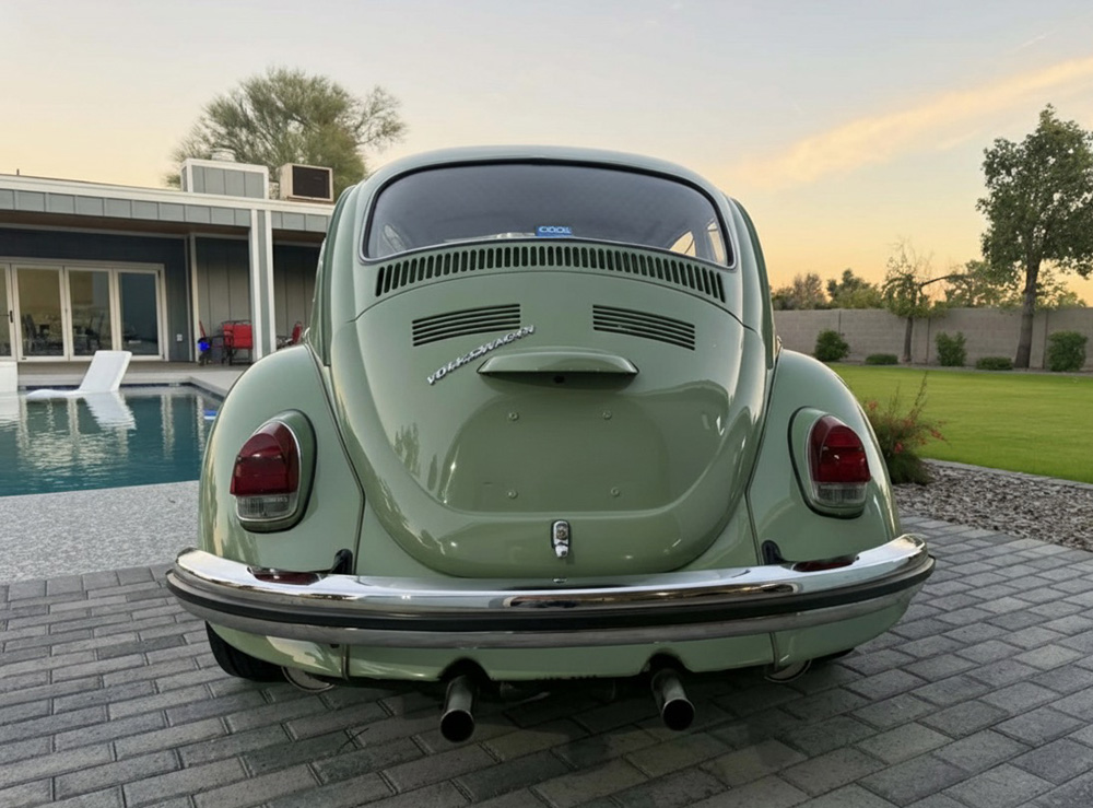 1973 Super Beetle parked by a pool