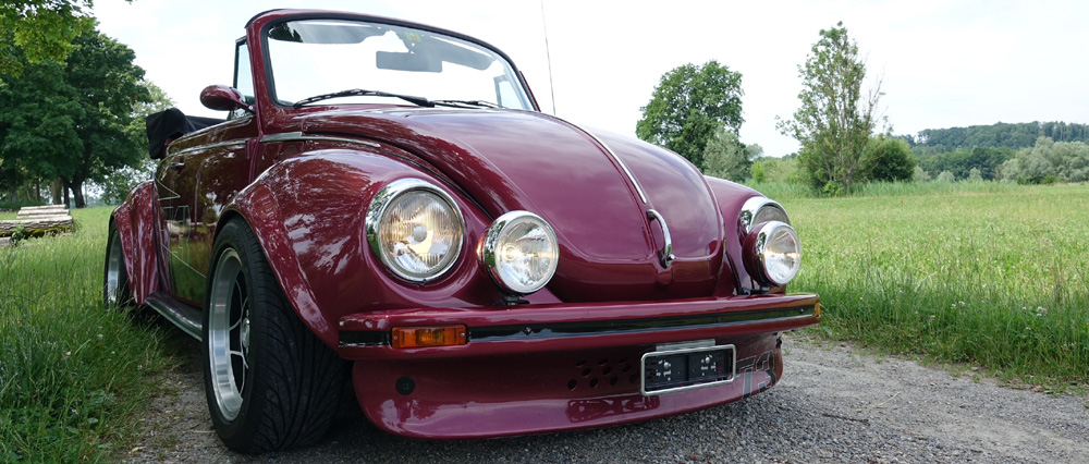 1303 Convertible in red with fog lights