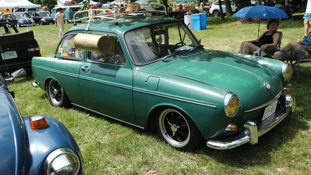 VW Notchback with air cooler on the window