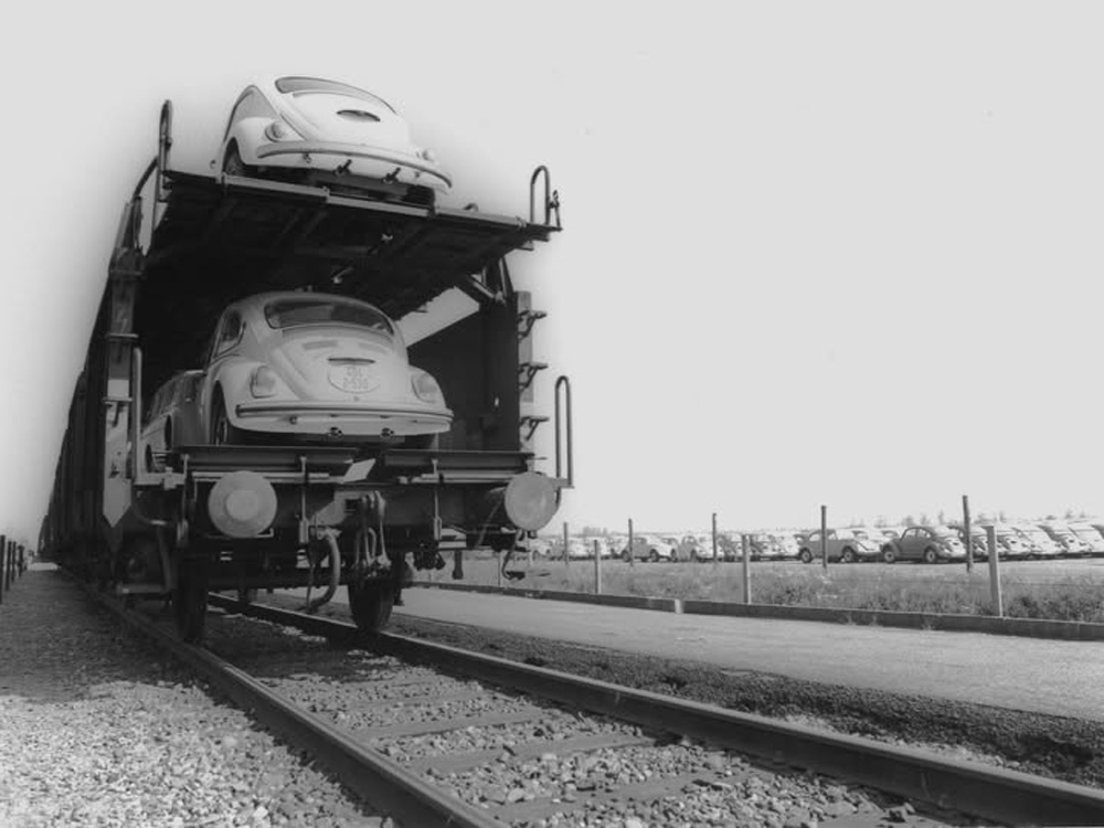 1302 VW Export Beetle on a train
